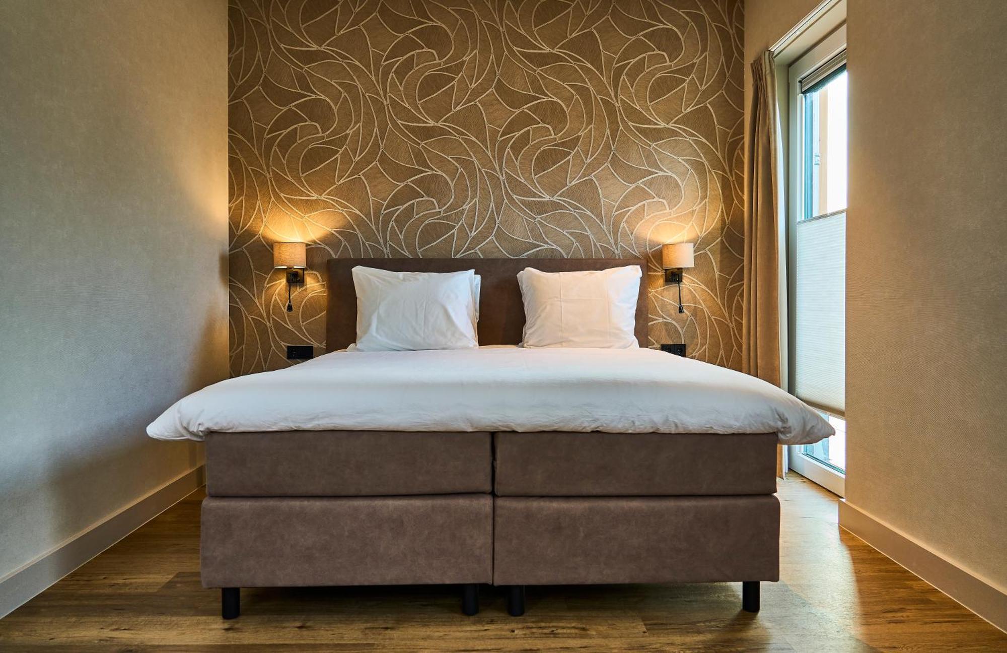 Eilandhotel Texel เดอค็อกส์ดอร์ป ภายนอก รูปภาพ A boxspring bed