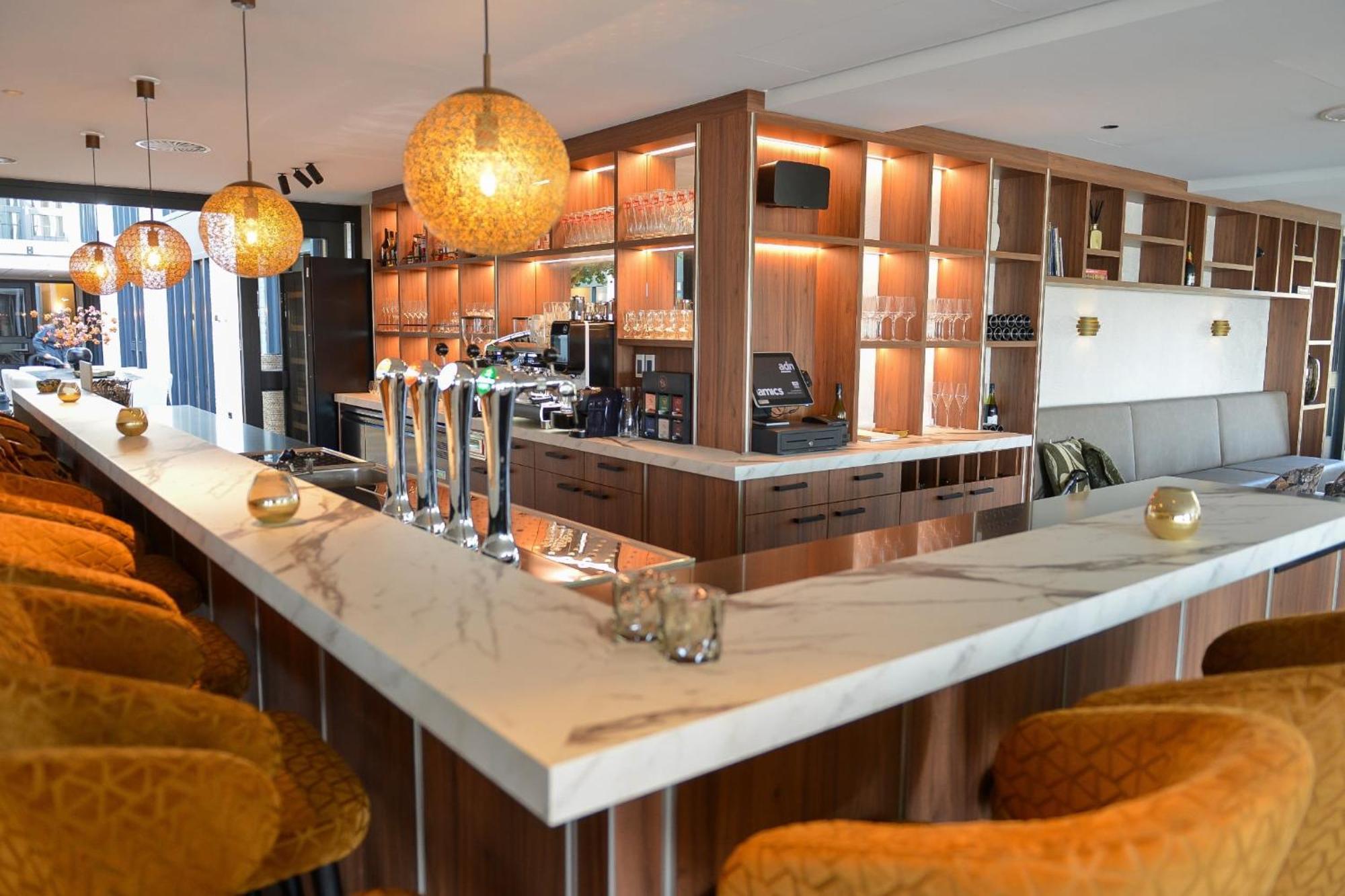 Eilandhotel Texel เดอค็อกส์ดอร์ป ภายนอก รูปภาพ The bar at the 1906 Lounge