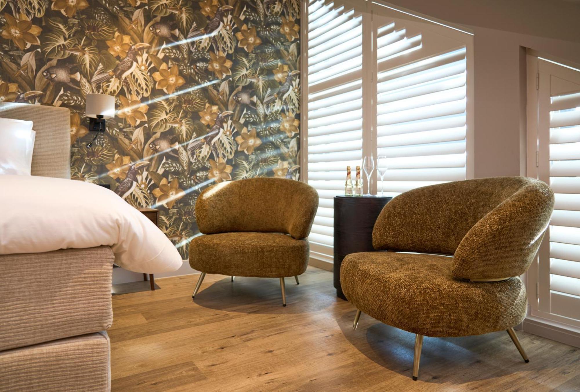 Eilandhotel Texel เดอค็อกส์ดอร์ป ภายนอก รูปภาพ The interior of a suite at the hotel